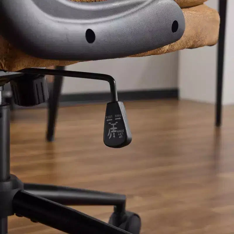 Fauteuil pivotant d'intérieur en similicuir noir avec dossier capitonné à clous et tirettes