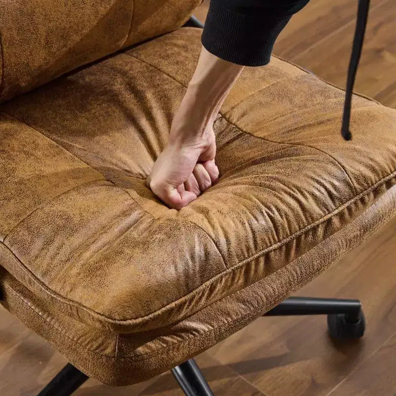 Fauteuil pivotant d'intérieur en similicuir noir avec dossier capitonné à clous et tirettes