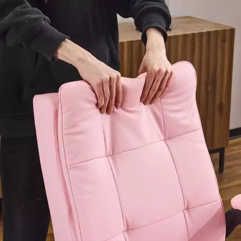 Fauteuil pivotant d'intérieur en similicuir noir avec dossier capitonné à clous et tirettes