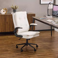 Fauteuil pivotant d'intérieur en similicuir noir avec dossier capitonné à clous et tirettes