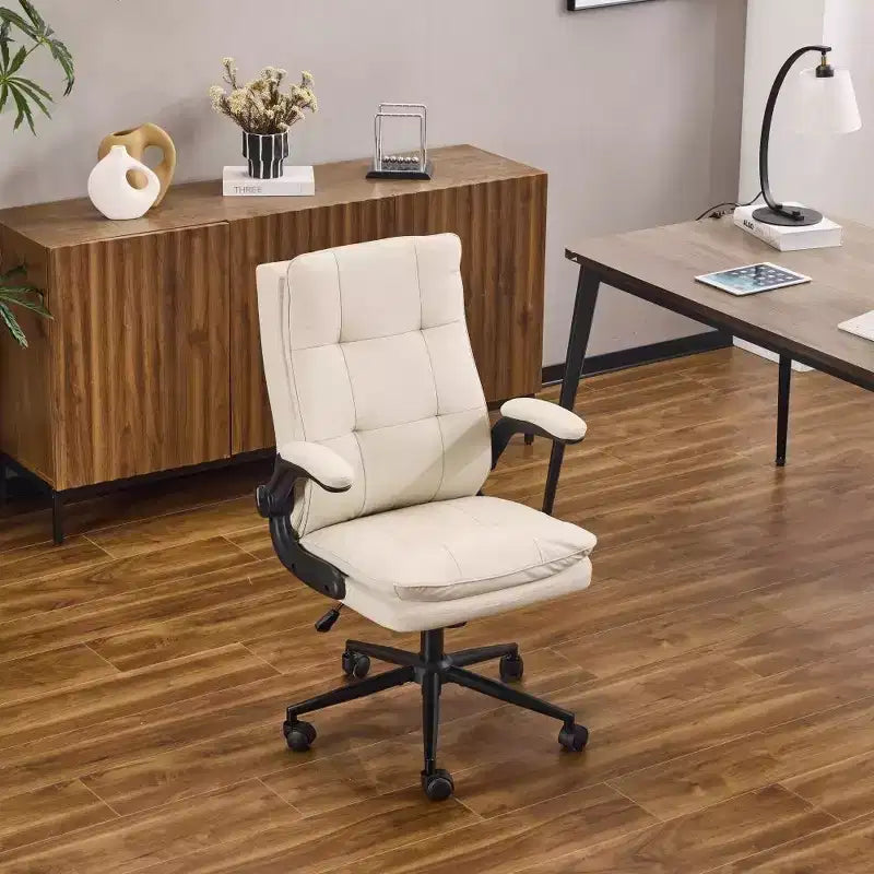 Fauteuil pivotant d'intérieur en similicuir noir avec dossier capitonné à clous et tirettes